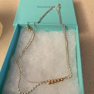Tiffany & Co. Silver gold ball style necklace.